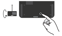 A finger pressing and holding power button at the bottom of MXCW640